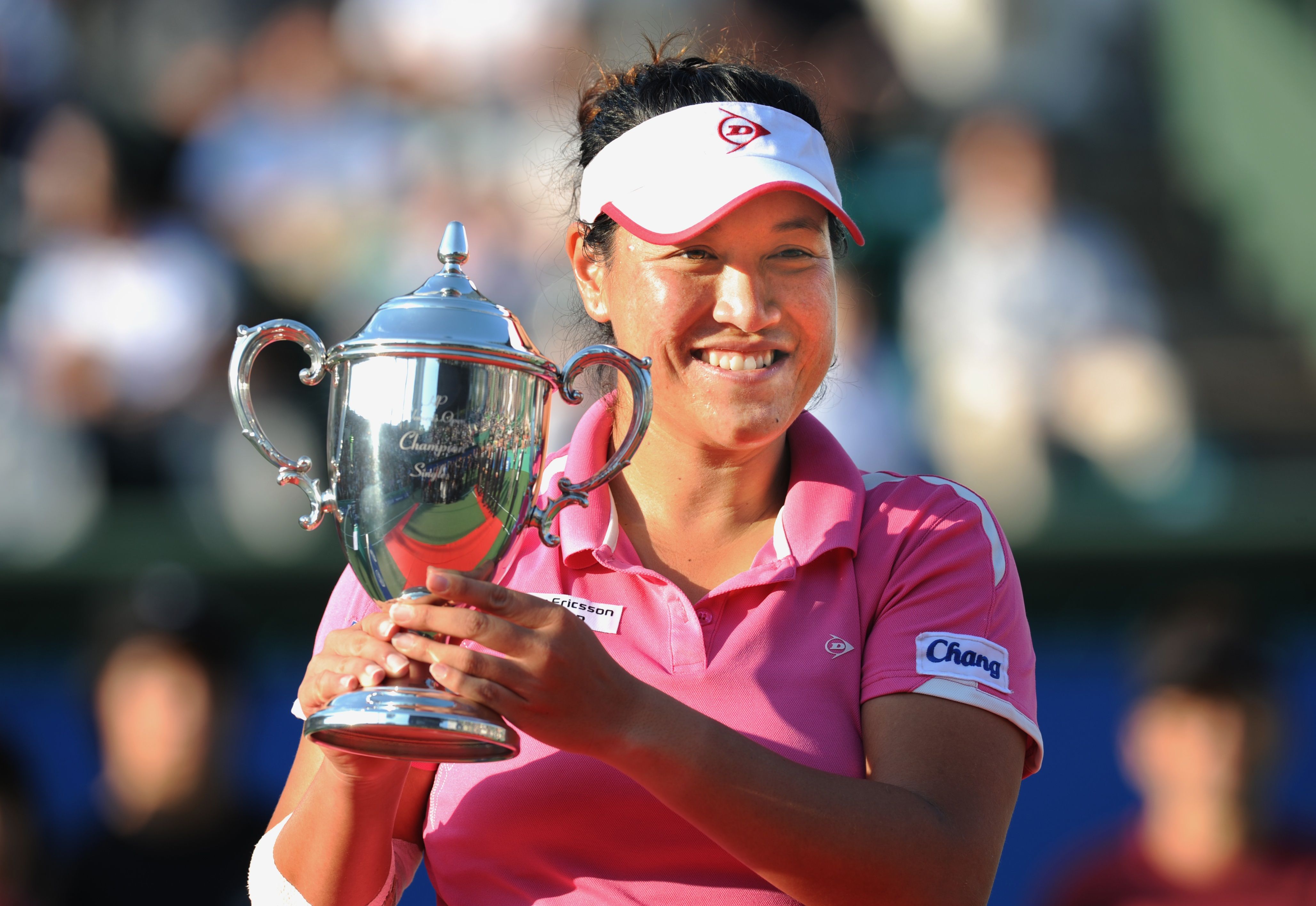 Tamarine Tanasugarn of Thailand holds the champions trophy during an awards ceremony following her women's singles final match against Kimiko Date Krumm of Japan at the Japan Women's Open tennis tournament in Osaka on October 17, 2010. Tanasugarn won the match 7-5, 6-7, 6-1. AFP PHOTO/Kazuhiro NOGI / AFP / KAZUHIRO NOGI