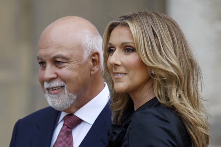 File photo of Canadian singer Dion posing with her husband Angelil during a ceremony at the Elysee Palace in Paris