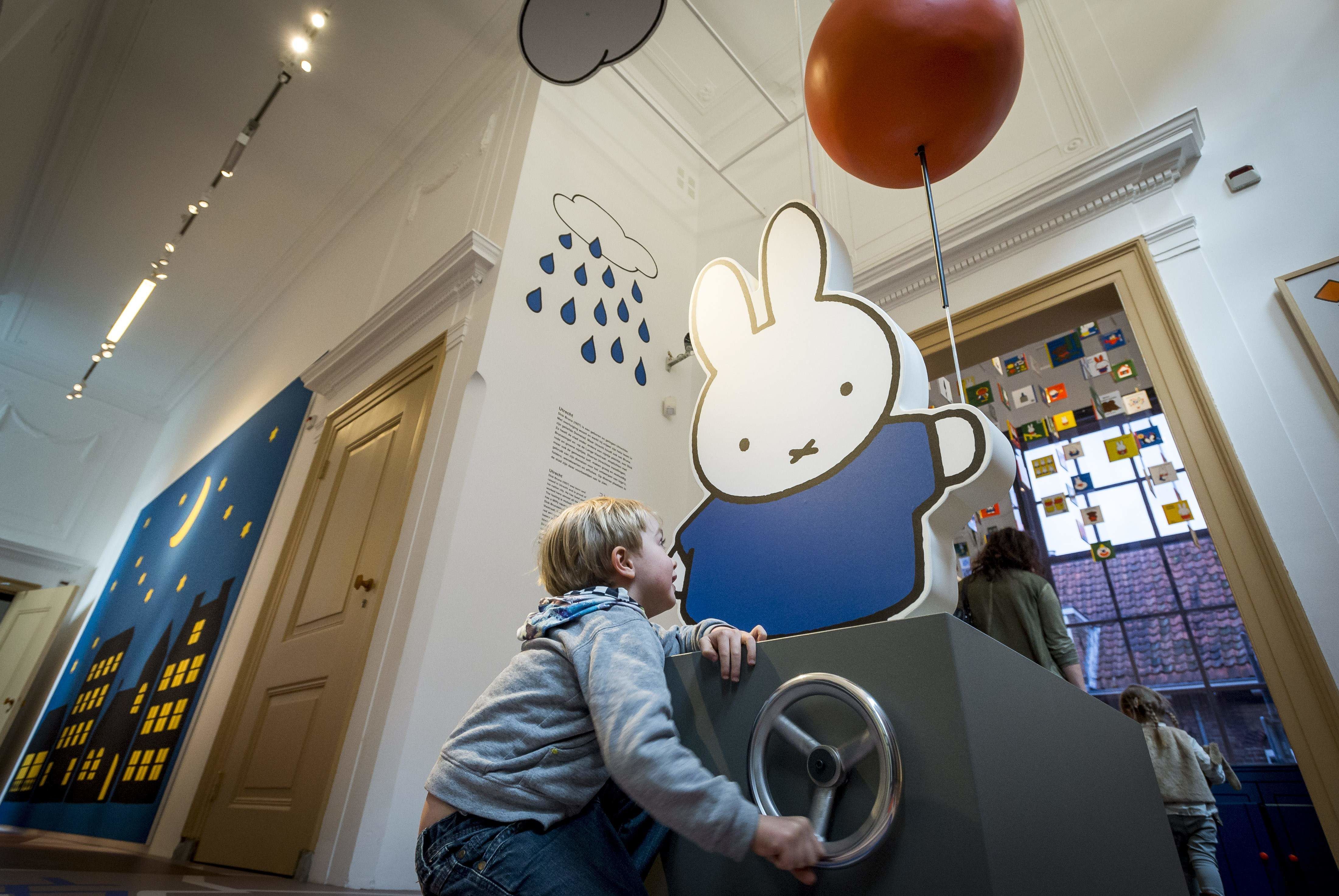 Children play during the official reopening of the 'Nijntje Museum' (Miffy Museum) in Utrecht on February 5, 2016. Miffy is a small female rabbit character created by Dutch author and illustrator Dick Bruna. The museum has replaced the closed Dick Bruna House. / AFP / ANP / Lex van Lieshout / RESTRICTED TO EDITORIAL USE - MANDATORY MENTION OF THE ARTIST UPON PUBLICATION - TO ILLUSTRATE THE EVENT AS SPECIFIED IN THE CAPTION