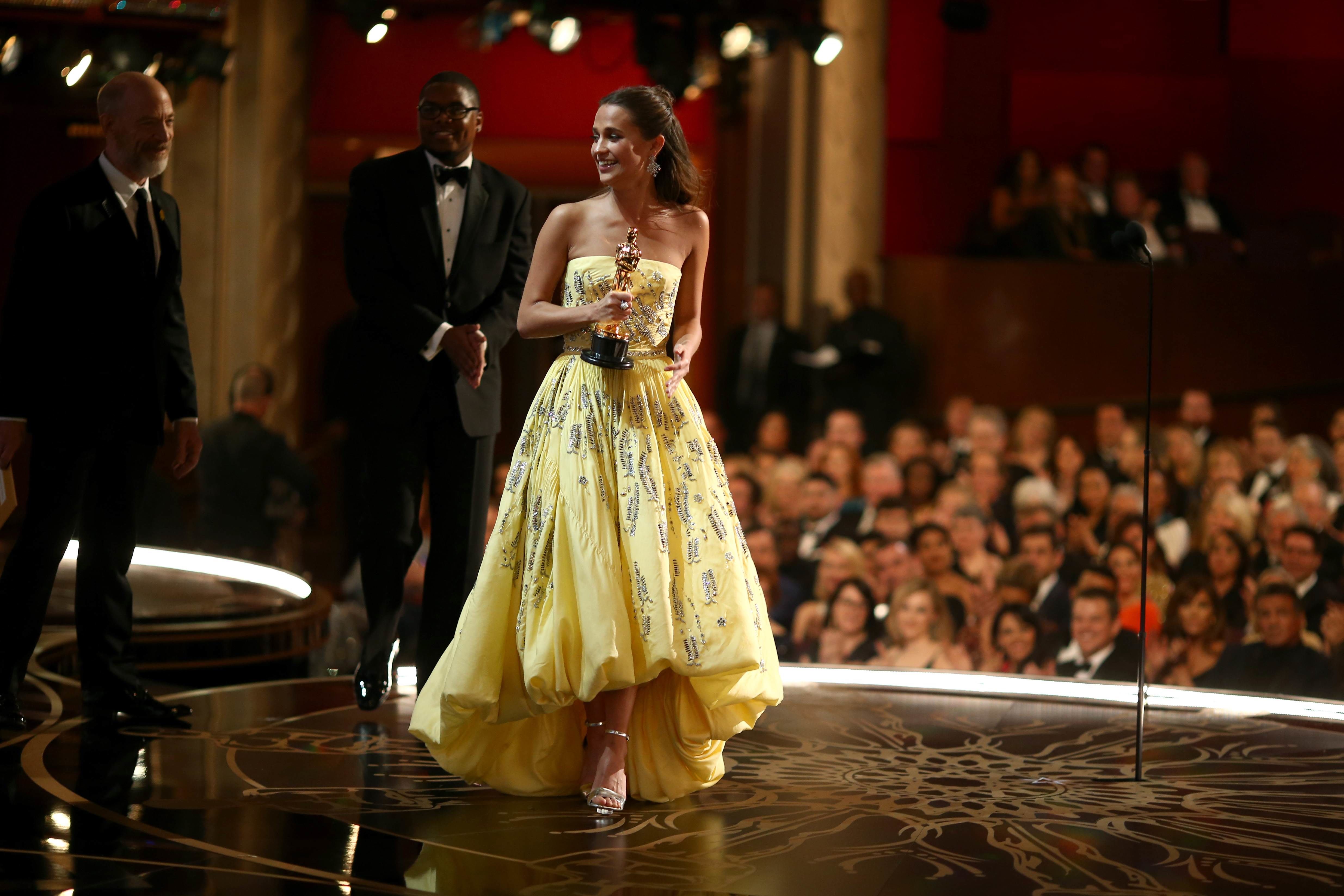 HOLLYWOOD, CA - FEBRUARY 28: Actress Alicia Vikander, winner of Best Supporting Actress award for 'The Danish Girl,' walks offstage at the 88th Annual Academy Awards at Hollywood & Highland Center on February 27, 2016 in Hollywood, California. Christopher Polk/Getty Images/AFP == FOR NEWSPAPERS, INTERNET, TELCOS & TELEVISION USE ONLY ==