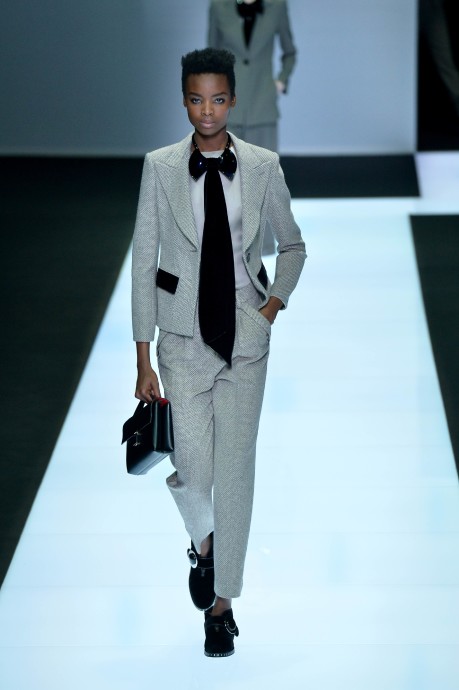 A model presents a creation for fashion house Giorgio Armani as part of the Women Autumn / Winter 2016 Milan Fashion Week on February 29, 2016. AFP PHOTO / TIZIANA FABI