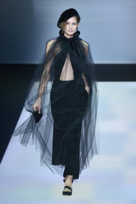 A model presents a creation for fashion house Giorgio Armani as part of the Women Autumn / Winter 2016 Milan Fashion Week on February 29, 2016. AFP PHOTO / TIZIANA FABI