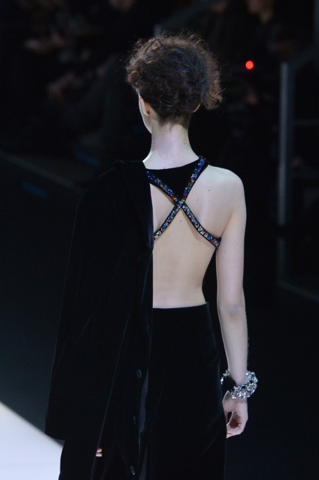 A model presents a creation for fashion house Giorgio Armani as part of the Women Autumn / Winter 2016 Milan Fashion Week on February 29, 2016. AFP PHOTO / TIZIANA FABI