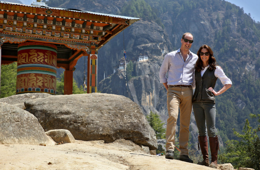 Britain's Prince William, Duke of Cambridge poses with his wife Catherine, Duchess of Cambridge in front of the Paro Taktsang Monastery, Bhutan, April 15, 2016. REUTERS/Cathal McNaughton TPX IMAGES OF THE DAY