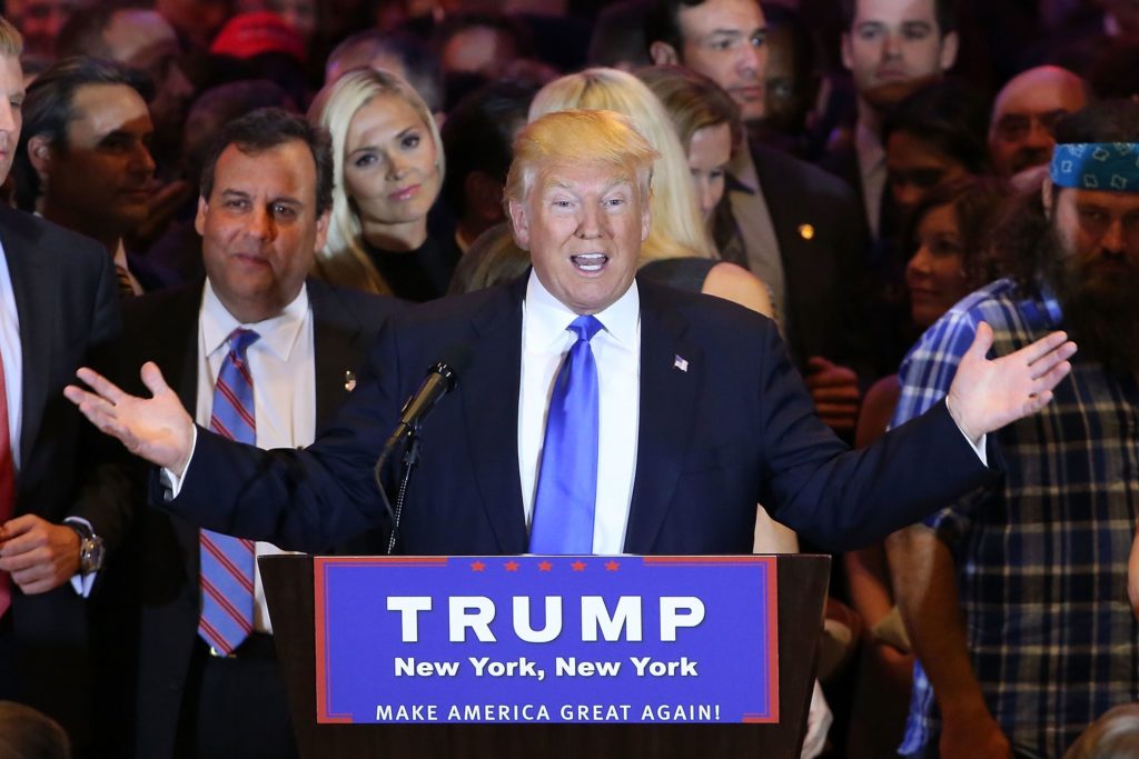 NEW YORK, NY - APRIL 26: Republican presidential candidate Donald Trump speaks to supporters and the media with New Jersey Governor Chris Christie behind him at Trump Towers following the conclusion of primaries Tuesday in northeastern states on April 26, 2016 in New York, New York. Trump again gained more delegates to move him closer to the Republican presidential nomination. Spencer Platt/Getty Images/AFP == FOR NEWSPAPERS, INTERNET, TELCOS & TELEVISION USE ONLY ==