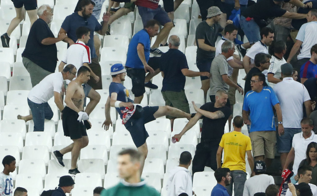 Football Soccer - England v Russia - EURO 2016 - Group B - Stade Vélodrome, Marseille, France - 11/6/16 England fans try to escape trouble in the stadium at full time REUTERS/Eddie Keogh Livepic