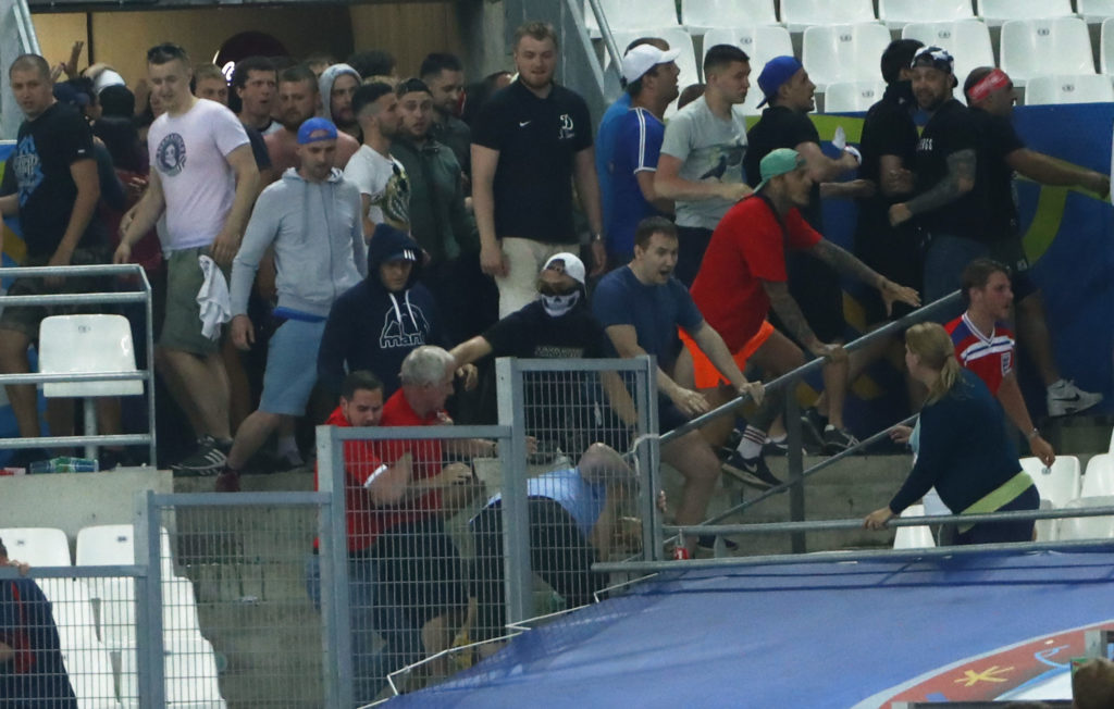 Football Soccer - England v Russia - EURO 2016 - Group B - Stade Vélodrome, Marseille, France - 11/6/16 England fans try to escape trouble in the stadium as clashes breakout REUTERS/Eddie Keogh Livepic