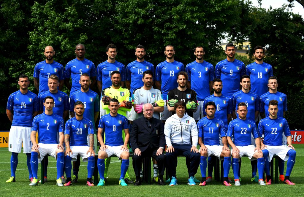 Italy soccer team players pose on June 1, 2016 in the Florence's Coverciano training camp, during the official presentation prior to the Euro Championship in France. From top left : Italy's forward Simone Zaza, Italy's defender Angelo Obinze Ogbonna, Italy's midfielder Thiago Motta, Italy's defender Andrea Barzagli, Italy's defender Leonardo Bonucci, Italy's defender Giorgio Chiellini, Italy's forward Graziano Pellè, Italy's midfielder Marco Parolo. From left center : Italy's midfielder Stefano Sturaro, Italy's forward Simone Zaza, Italy's midfielder Daniele De Rossi, Italy's goalkeeper Salvatore Sirigu, Italy's goalkeeper Gianluigi Buffon, Italy's goalkeeper Federico Marchetti, Italy's midfielder Antonio Candreva, Italy's midfielder Matteo Darmian, Italy's midfielder Federico Bernardeschi. From left bottom : Italy's midfielder Mattia De Sciglio, Italy's forward Lorenzo Insigne, Italy's midfielder Alessandro Florenzi, President Carlo Tavecchio, Italy's coach Antonio Conte, Italy's forward Citadin Martins Ede, Italy's midfielder Emanuele Giaccherini, Italy's midfielder Stephan El Shaarawy. / AFP PHOTO / VINCENZO PINTO