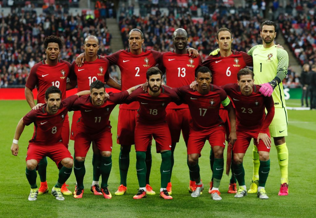 (Top L-R) Portugal's Eliseu, Portugal's attacker Joao Eduardo, Portugal's defender Bruno Alves, Portugal's Danilo, Portugal's defender Ricardo Carvalho, Portugal's goalkeeper Rui Patricio and (bottom L-R) Portugal's midfielder Joao Moutinho, Portugal's Vieirinha, Portugal's Rafa, Portugal's attacker Nani and Portugal's Adrien pose before the friendly football match between England and Portugal at Wembley stadium in London on June 2, 2016. / AFP PHOTO / ADRIAN DENNIS
