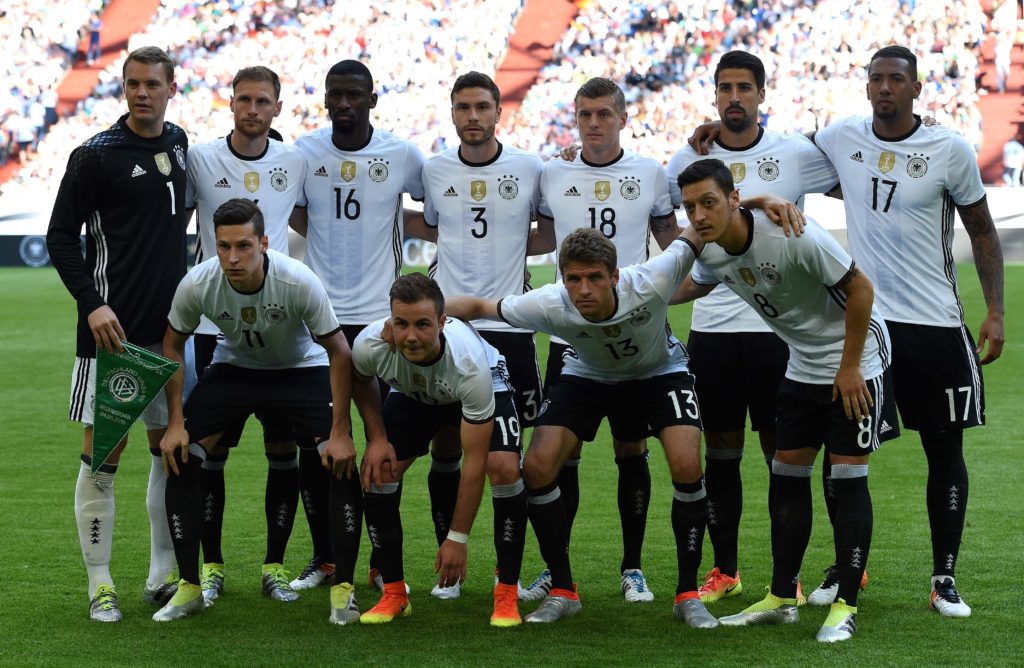 German players (backl-r) goalkeepr Manuel Neuer, Benedikt Hoewedes, Antonio Ruediger, Jonas Hector, Toni Kroos, Sami Khedira, Jerome Boateng, (front l-r) Julian Draxler, Mario Goetze, Thomas Mueller, Mesut Oezil pose prior to during the UEFA EURO 2016 friendly football match Germany vs Hungary at the Veltins Arena in Gelsenkirchen, western Germany on June 4, 2016. / AFP PHOTO / PATRIK STOLLARZ