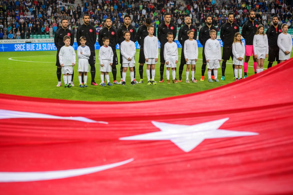 Turkey4s players stand prior to the kick off of the pre-Euro 2016 football friendly match at Stadium Stozice in Ljubljana, Slovenia on June 5, 2016. / AFP PHOTO / Jure Makovec/AFP