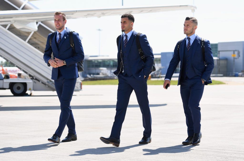 In this handout picture released by the Football Association (FA) (L-R) England players Harry Kane, Kyle Walker and Jack Wilshere walk toward the plane to depart for France for the UEFA Euro 2016 European football championships at Luton Airport in Luton, north of London, on June 6, 2016. England's opening match at the European Championship is against Russia on June 11. / AFP PHOTO / FOOTBALL ASSOCIATION (FA) / Michael Regan / RESTRICTED TO EDITORIAL USE - MANDATORY CREDIT " AFP PHOTO / FA / MICHAEL REGAN " - NO MARKETING NO ADVERTISING CAMPAIGNS - DISTRIBUTED AS A SERVICE TO CLIENTS