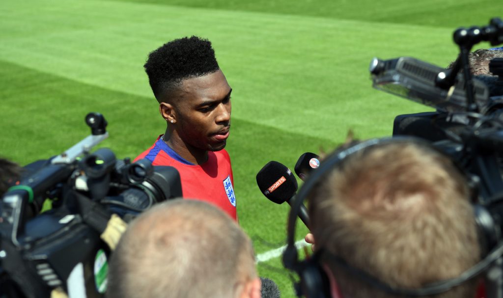 England's forward Daniel Sturridge speaks to the media at their training ground in Chantilly, on June 7, 2016 during the Euro 2016 football tournament.  / AFP PHOTO / PAUL ELLIS