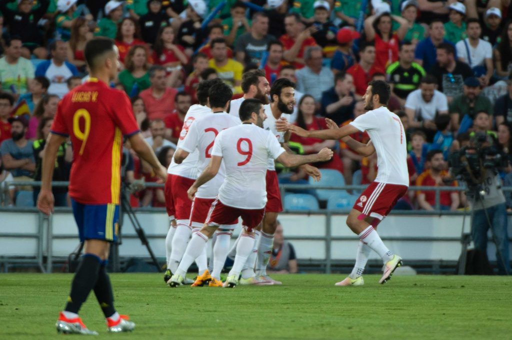 Georgia's midfielder Tornike Okriashvili (2ndR) celebrates with teammates after scoring during the EURO 2016 friendly football match Spain vs Georgia at the Coliseum Alfonso Perez stadium in Getafe, on June 7, 2016, in preparation for the upcoming Euro 2016 European football championship. / AFP PHOTO / CURTO DE LA TORRE