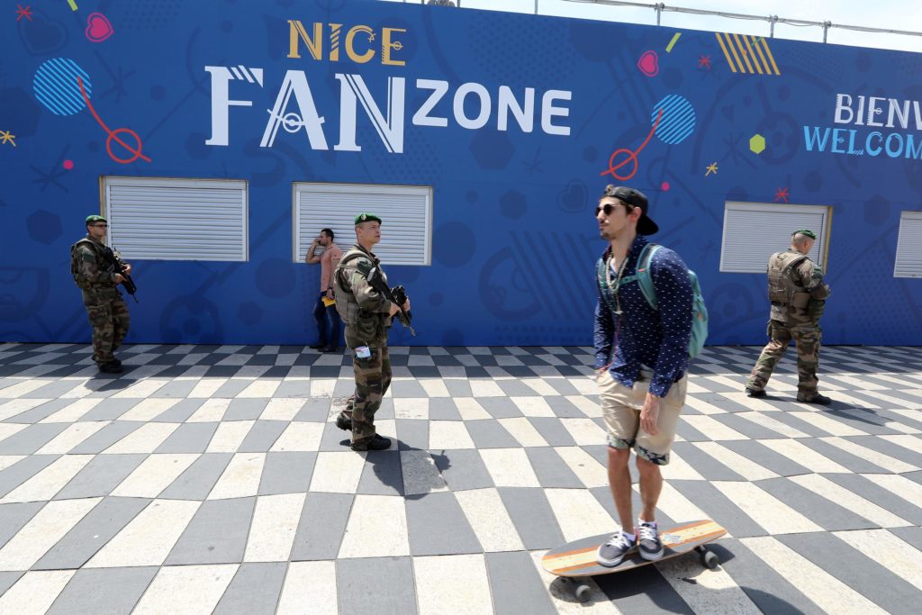 French soldiers patrol in the fan zone in Nice, southeastern France on June 8, 2016, two days before the start of the Euro 2016 football championship, to be held in France from June 10 till July 10, 2016.  Organisers of Europe's four-yearly football extravaganza already face security jitters and Britain joined the United States in warning the tournament could be a target for terror attacks. / AFP PHOTO / VALERY HACHE