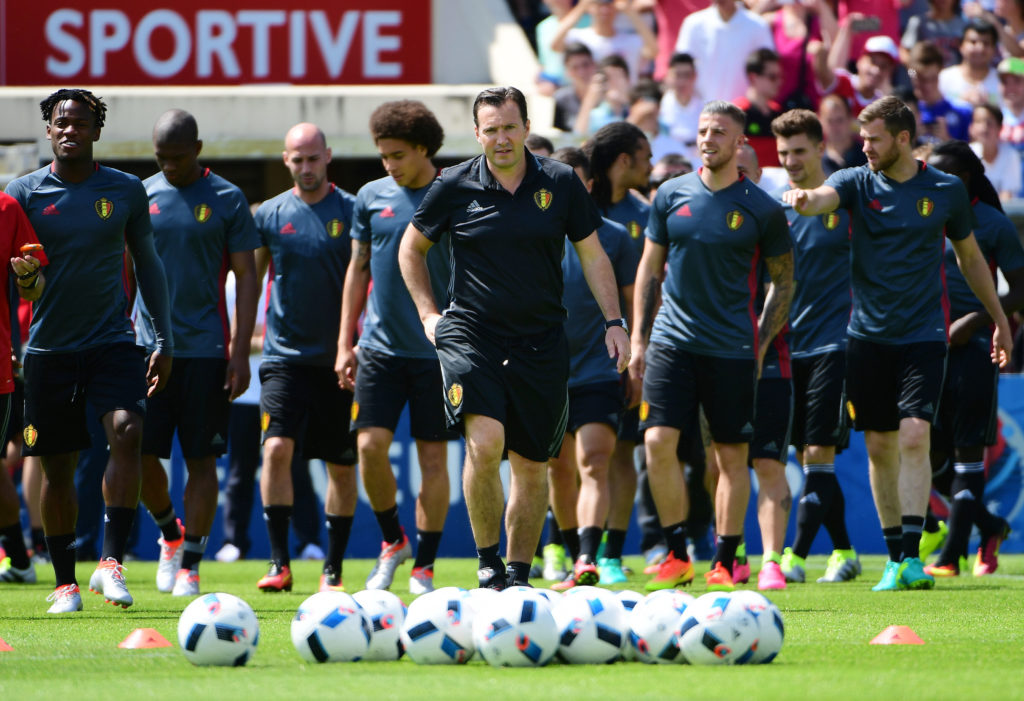 Belgium's coach Marc Wilmots (C) leads Belgium players onto the field during a public training session during the Euro 2016 football tournament at the Chaban-Delmas Stadium in Bordeaux, on June 8, 2016.   / AFP PHOTO / EMMANUEL DUNAND