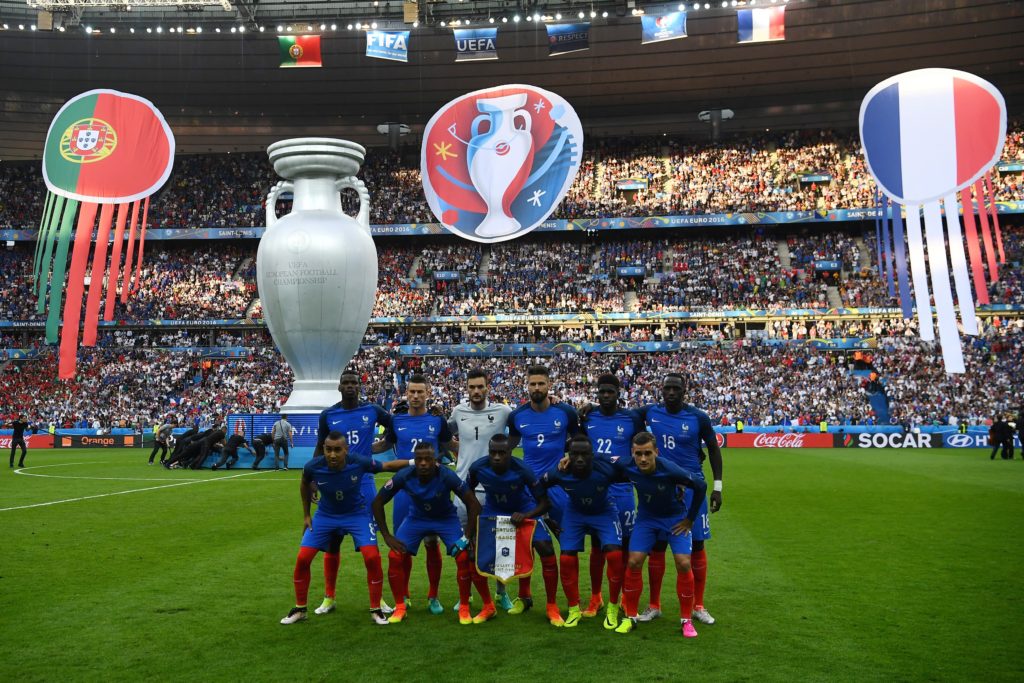 Top row from left: France's midfielder Paul Pogba, France's defender Laurent Koscielny, France's goalkeeper Hugo Lloris, France's forward Olivier Giroud, France's defender Samuel Umtiti, France's midfielder Moussa Sissoko and bottom row from left : France's forward Dimitri Payet, France's defender Patrice Evra, France's midfielder Blaise Matuidi, France's defender Bacary Sagna and France's forward Antoine Griezmann pose for a group photo prior to the start of the Euro 2016 final football match between France and Portugal at the Stade de France in Saint-Denis, north of Paris, on July 10, 2016. / AFP PHOTO / FRANCK FIFE