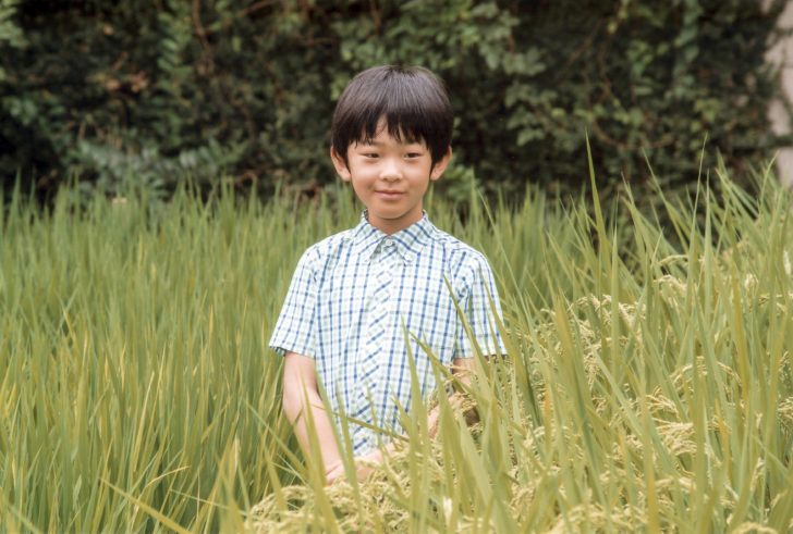Japan's Prince Hisahito, the only son of Prince Akishino and Princess Kiko, poses at a rice field of the Akasaka Detached Palace in Tokyo