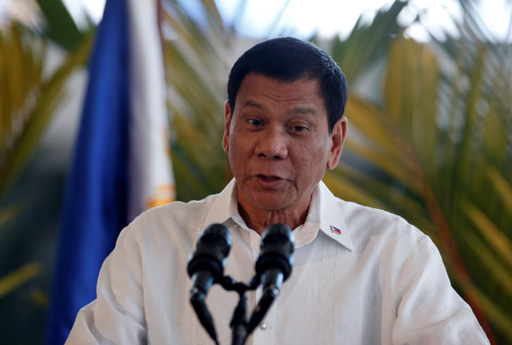 President Rodrigo Duterte speaks before his departure for Japan, at the Ninoy Aquino International airport in Paranaque, Metro Manila