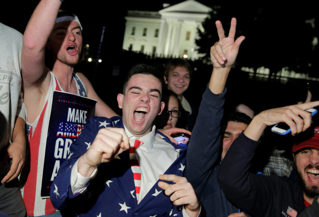 Supporters of Republican presidential candidate Donald Trump rally in front of the White House in Washington, U.S. November 9, 2016. REUTERS/Joshua Roberts