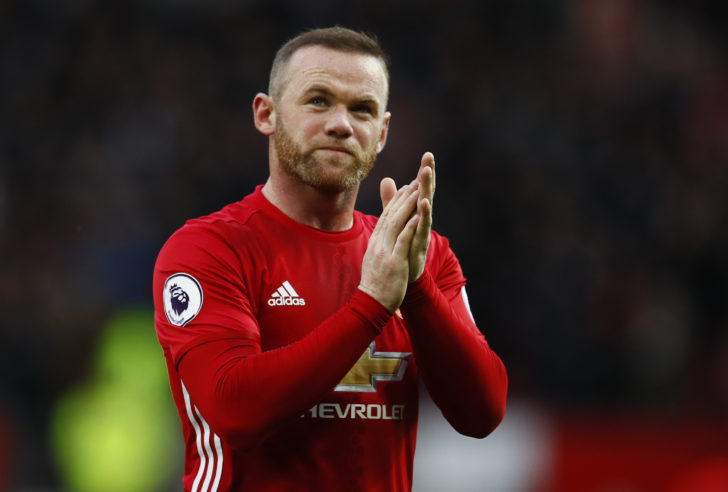 Manchester United's Wayne Rooney applauds the fans after the match