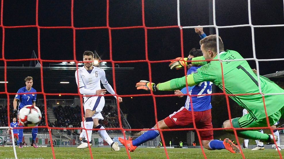 Liechtenstein's goalkeeper Peter Jehle (R) concedes a goal to Italy's midfielder Antonio Candreva during the FIFA World Cup 2018 European zone group G qualifying football match beetween Liechtenstein and Italy at the Rheinpark Stadion in Vaduz on November 12, 2016. / AFP / FABRICE COFFRINI (Photo credit should read FABRICE COFFRINI/AFP/Getty Images)