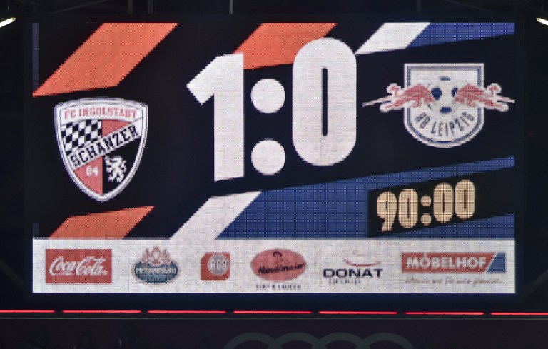 The scoreboard is pictured during the German first division Bundesliga football match between Ingolstadt and Leipzig in Ingolstadt, southern Germany, on December 10, 2016. / AFP PHOTO / GUENTER SCHIFFMANN / RESTRICTIONS: DURING MATCH TIME: DFL RULES TO LIMIT THE ONLINE USAGE TO 15 PICTURES PER MATCH AND FORBID IMAGE SEQUENCES TO SIMULATE VIDEO. == RESTRICTED TO EDITORIAL USE == FOR FURTHER QUERIES PLEASE CONTACT DFL DIRECTLY AT + 49 69 650050