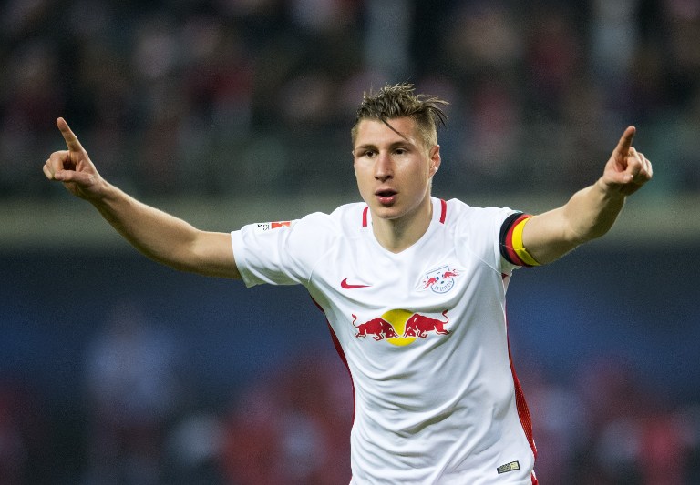 Leipzig´s defender Willi Orban celebrates after scoring the second goal during German first division Bundesliga football match between RB Leipzig and Hertha BSC Berlin in Leipzig, eastern Germany on December 17, 2016. / AFP PHOTO / ROBERT MICHAEL / RESTRICTIONS: DURING MATCH TIME: DFL RULES TO LIMIT THE ONLINE USAGE TO 15 PICTURES PER MATCH AND FORBID IMAGE SEQUENCES TO SIMULATE VIDEO. == RESTRICTED TO EDITORIAL USE == FOR FURTHER QUERIES PLEASE CONTACT DFL DIRECTLY AT + 49 69 650050 / RESTRICTIONS: DURING MATCH TIME: DFL RULES TO LIMIT THE ONLINE USAGE TO 15 PICTURES PER MATCH AND FORBID IMAGE SEQUENCES TO SIMULATE VIDEO. == RESTRICTED TO EDITORIAL USE == FOR FURTHER QUERIES PLEASE CONTACT DFL DIRECTLY AT + 49 69 650050