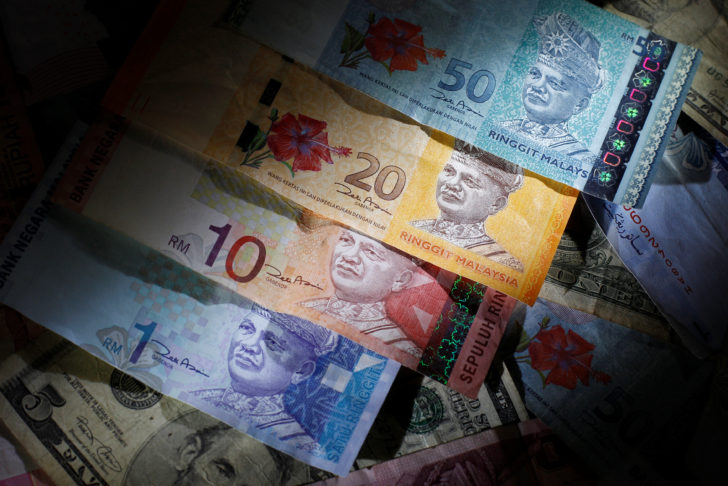 Photo illustration of Malaysian ringgit notes