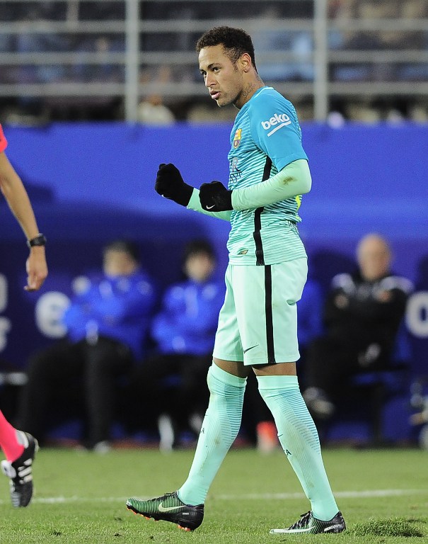 Barcelona's Brazilian forward Neymar celebrates after scoring his team's fourth goal during the Spanish league football match SD Eibar vs FC Barcelona at the Ipurua stadium in Eibar on January 22, 2017. / AFP PHOTO / ANDER GILLENEA