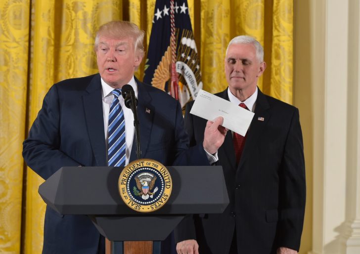 US President Donald Trump swears in senior staff at the White House