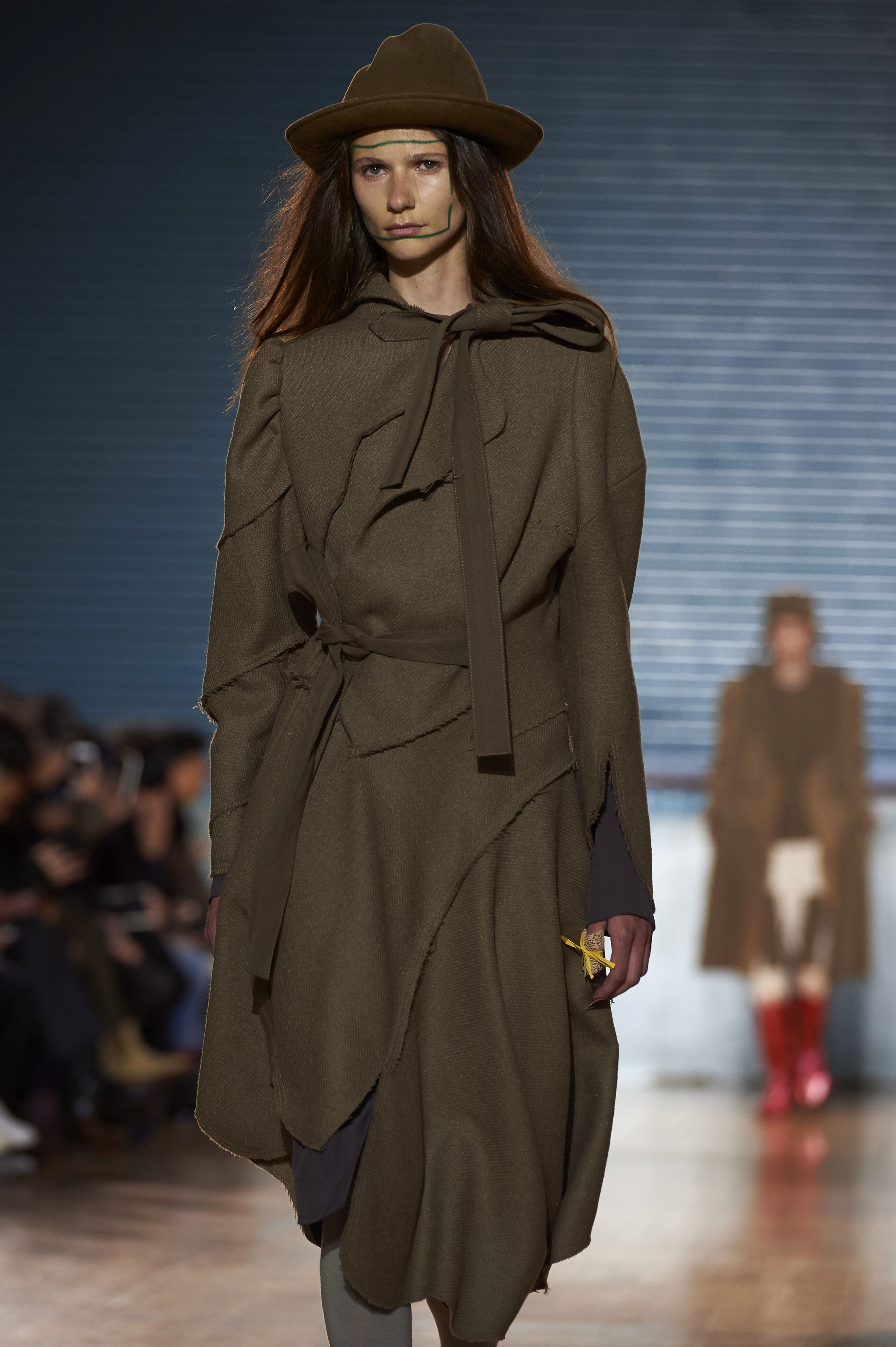 A model presents a creation by British designer Vivienne Westwood on the final day of the Autumn/Winter 2017 London Fashion Week Men's fashion event in London on January 9, 2017. / AFP PHOTO / NIKLAS HALLE'N
