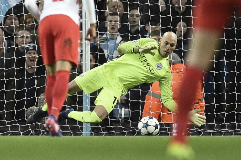 Manchester CIty's Argentinian goalkeeper Willy Caballero saves a penalty during the UEFA Champions League Round of 16 first-leg football match between Manchester City and Monaco at the Etihad Stadium in Manchester, north west England on February 21, 2017. / AFP PHOTO / Oli SCARFF