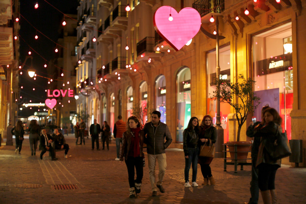 People take pictures in front of decorations ahead of Valentine's day in down town Beirut, Lebanon February 11, 2017. REUTERS/Jamal Saidi