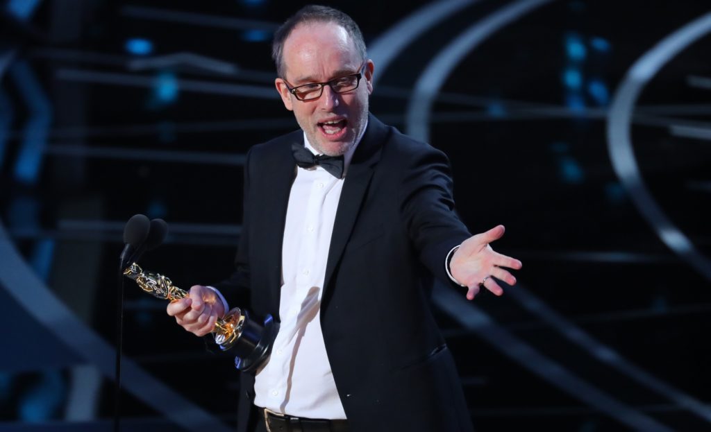 89th Academy Awards - Oscars Awards Show - Hollywood, California, U.S. - 26/02/17 - John Gilbert accepts the Oscar for Best Film Editing for "Hacksaw Ridge". REUTERS/Lucy Nicholson