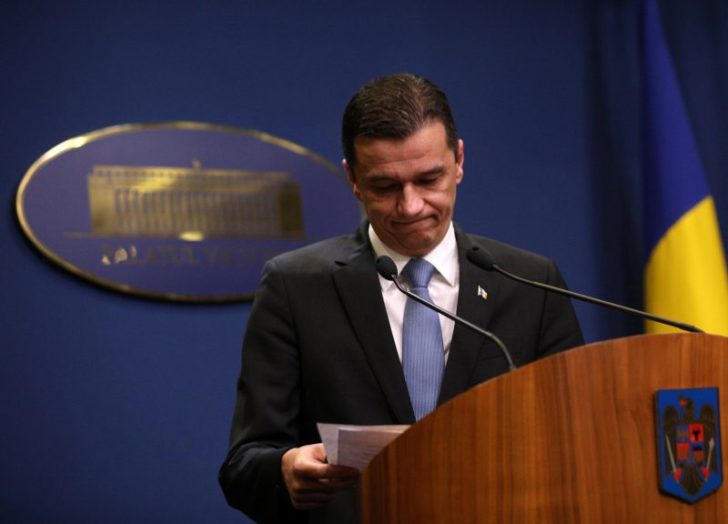 Romania's Prime Minister Grindeanu reacts after delivering a speech in Bucharest