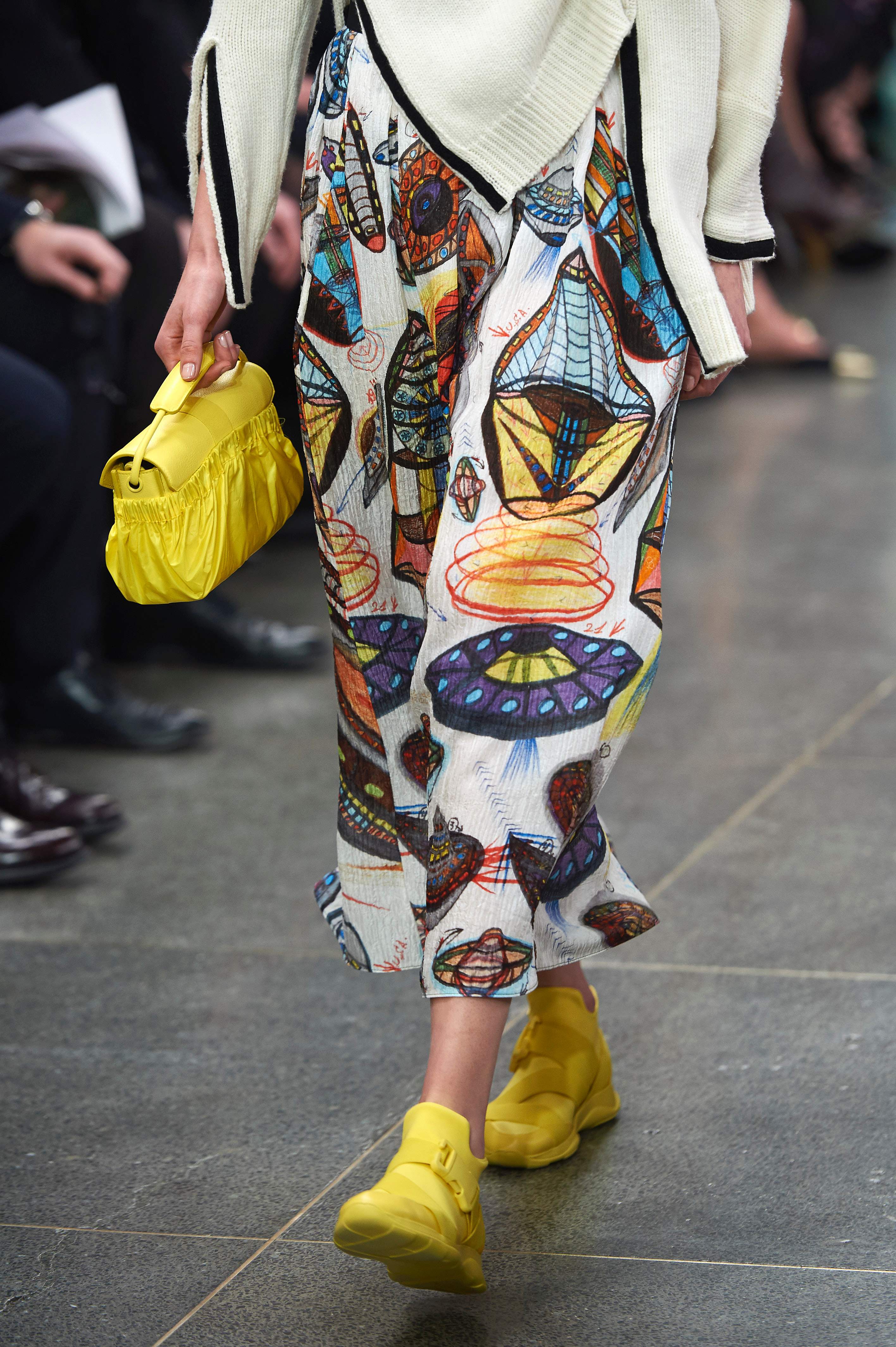 A model presents creations by British fashion designer Christopher Kane during a catwalk show on the fourth day of the Autumn/Winter 2017 London Fashion Week in London on February 20, 2017. / AFP PHOTO / NIKLAS HALLE'N