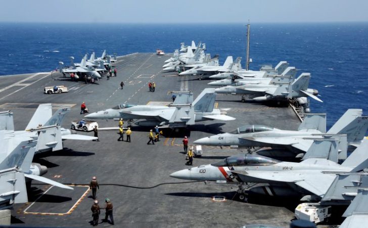 U.S. Navy F18 fighter jets are pictured on the flight deck of aircraft carrier USS Carl Vinson during a routine exercise in South China Sea