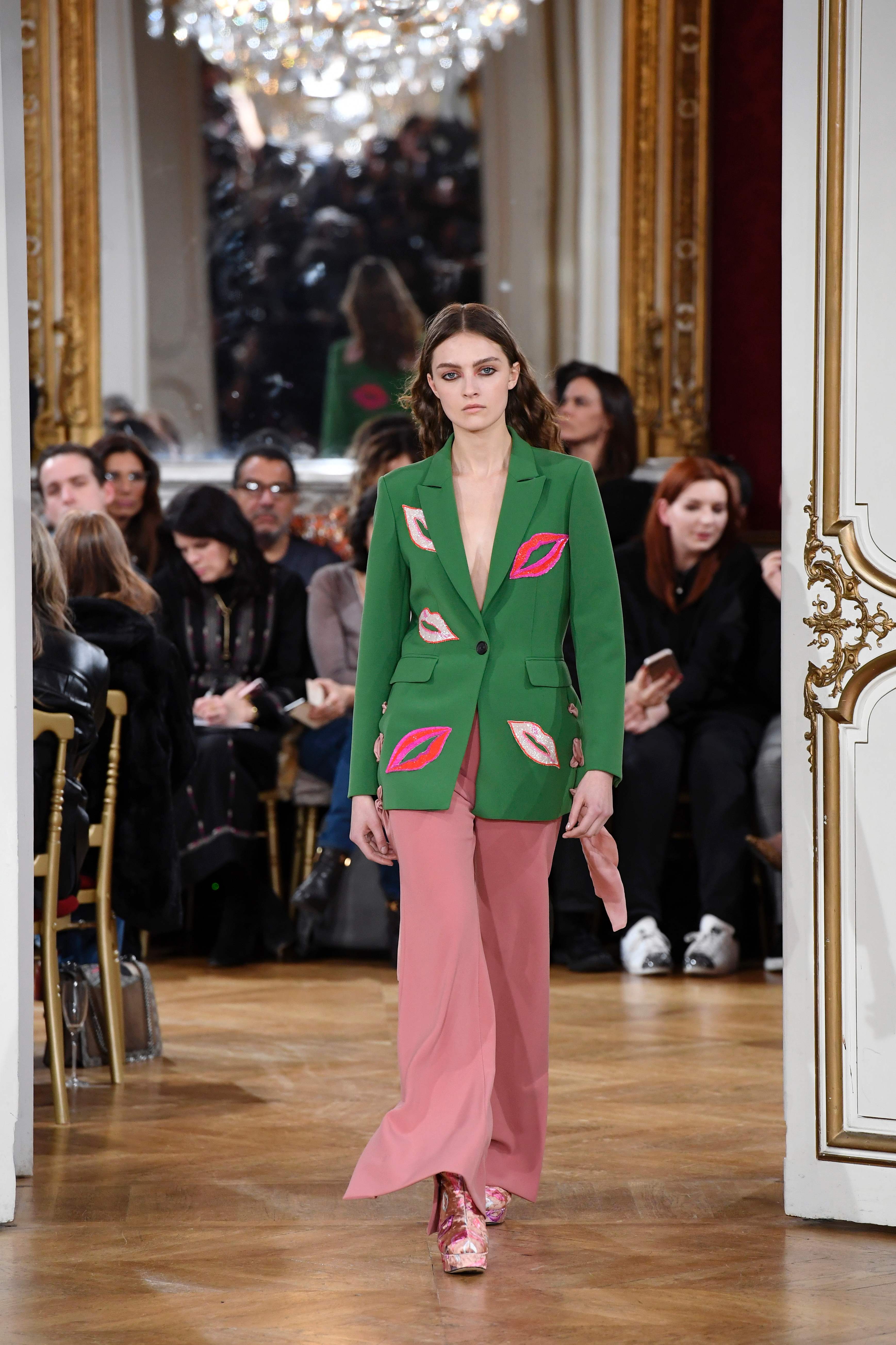 A model presents a creation by Paul and Joe during the women's Fall-Winter ready-to-wear collection fashion show in Paris on March 7, 2017. / AFP PHOTO / bertrand GUAY