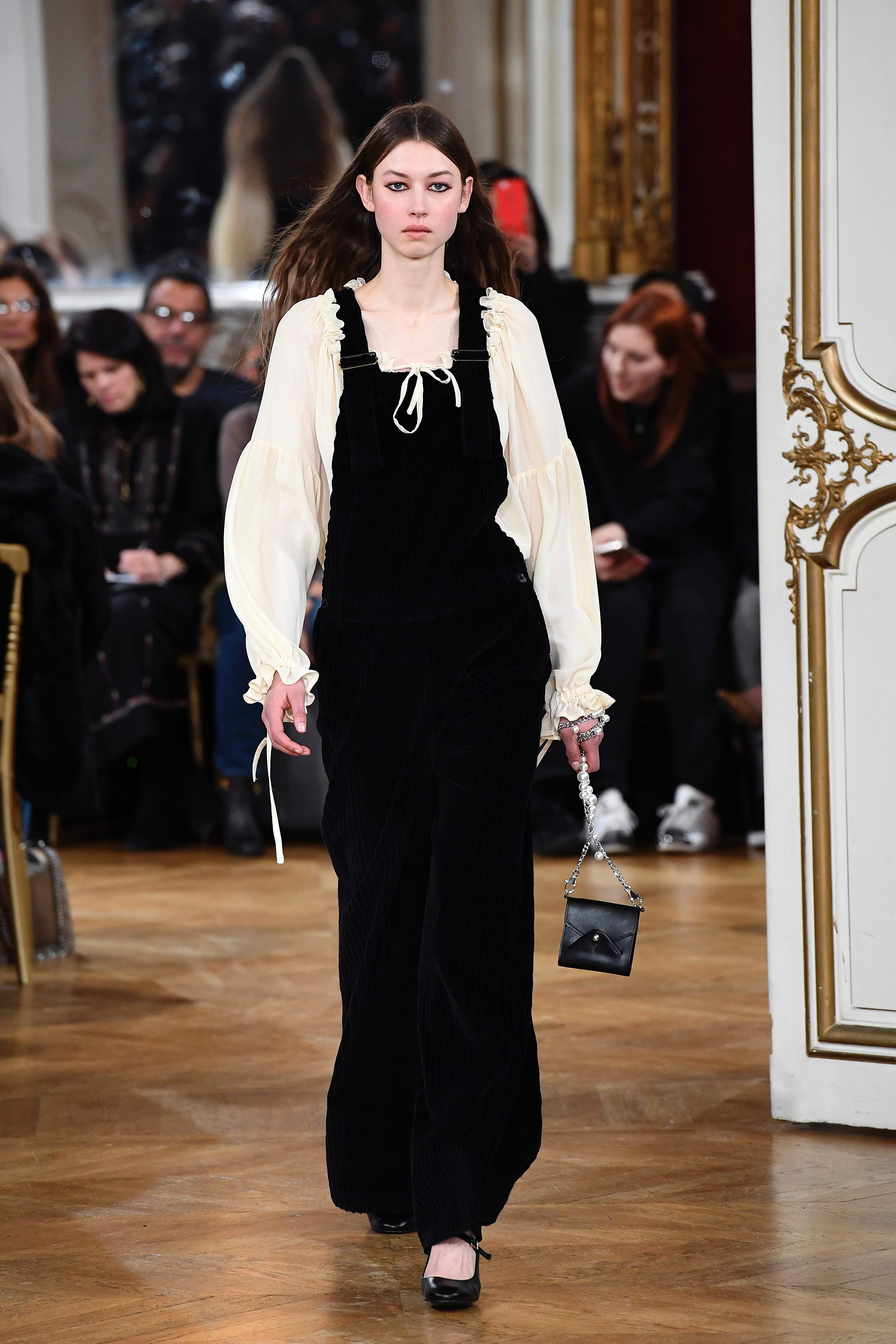A model presents a creation by Paul and Joe during the women's Fall-Winter ready-to-wear collection fashion show in Paris on March 7, 2017. / AFP PHOTO / bertrand GUAY