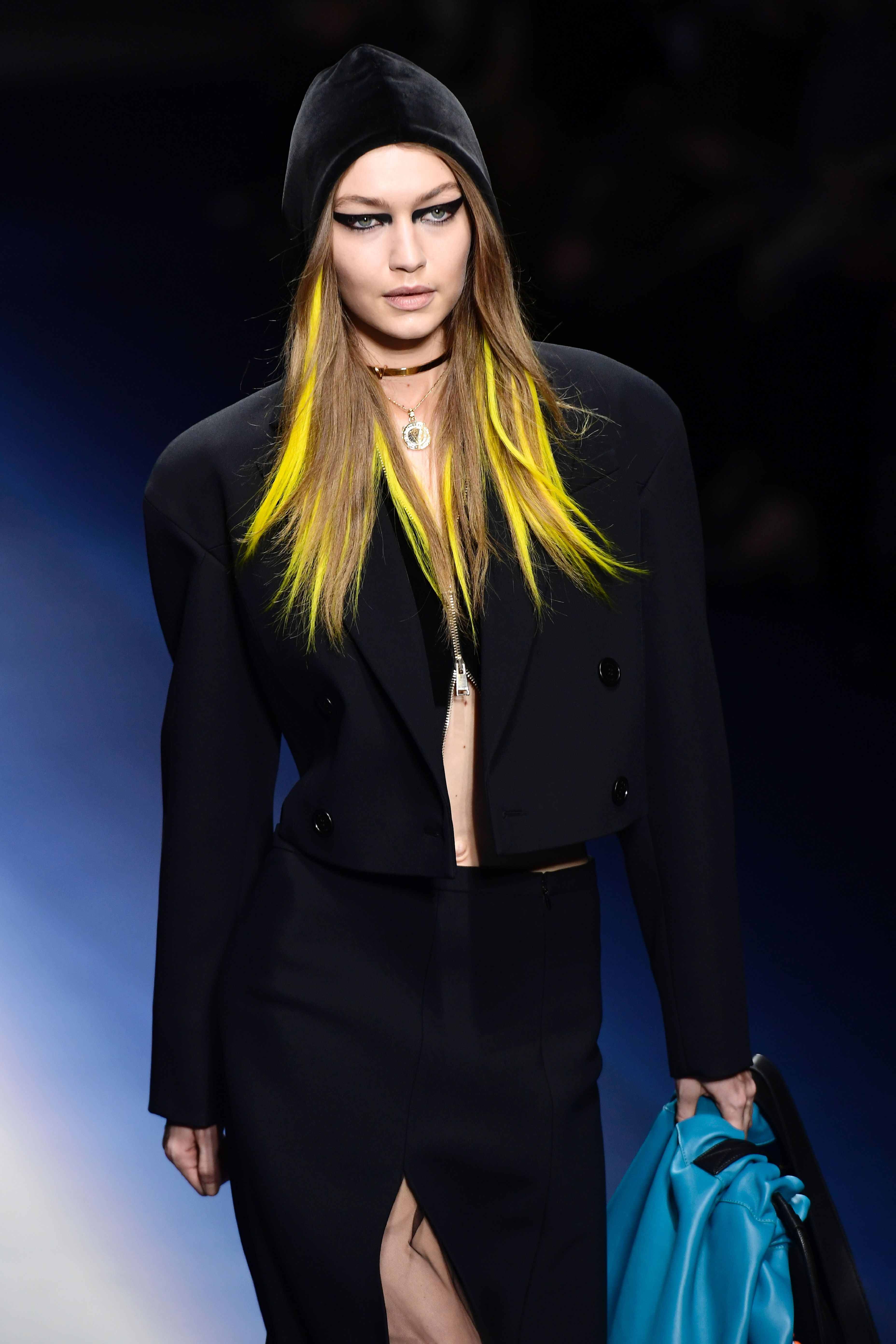 Model Gigi Hadid presents a creation for fashion house Versace during the Women's Fall/Winter 2017/2018 fashion week in Milan, on February 23, 2017. / AFP PHOTO / Miguel MEDINA