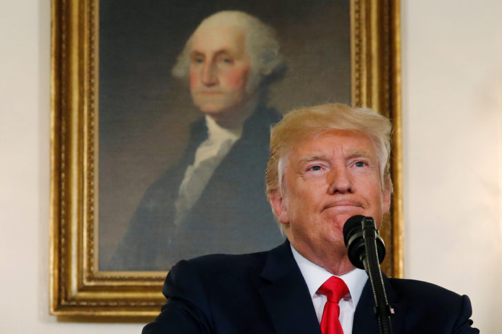 Trump pauses during a statement on the deadly protests in Charlottesville, at the White House in Washington
