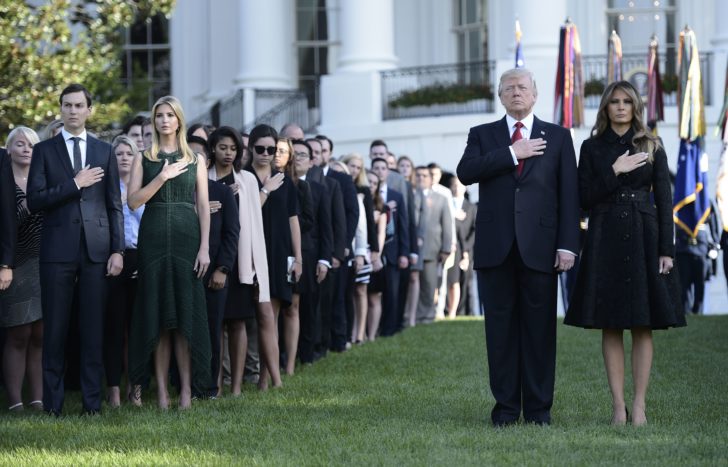 US President Donald Trump and First Lady Melania Trump observe a moment of silence at the White House on the anniversary of 9/11