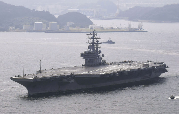 USS Ronald Reagan leaves from its home port to be deployed for a routine autumn patrol of the Western Pacific, in Yokosuka