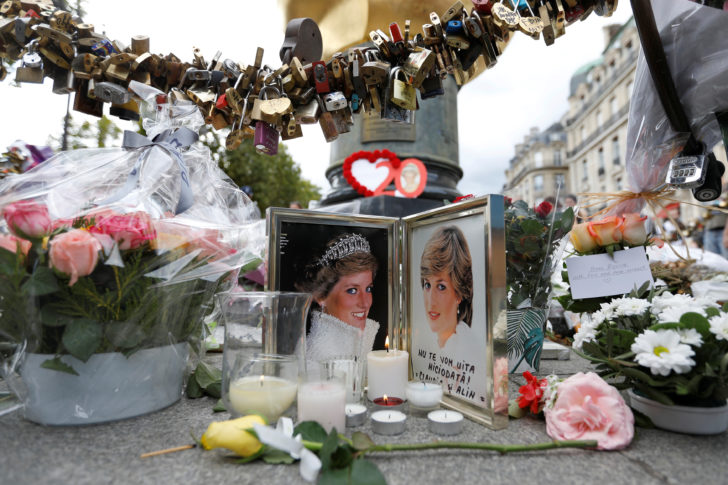 Flowers and tributes are left in memory of the late Princess Diana around the Liberty Flame monument in Paris