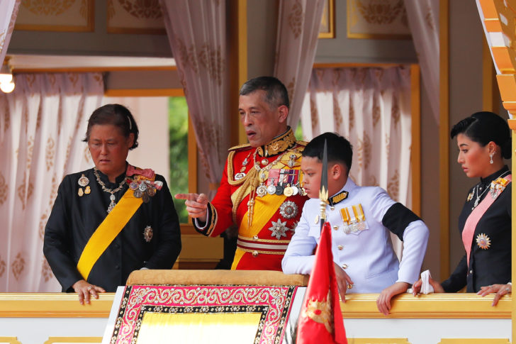 Thailand's King Maha Vajiralongkorn and other members of royal family take part in the royal cremation procession of late King Bhumibol Adulyadej at the Grand Palace in Bangkok