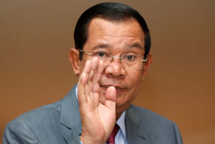 Cambodia's PM Hun Sen gestures as he attends a plenary session at the National Assembly of Cambodia in central Phnom Penh