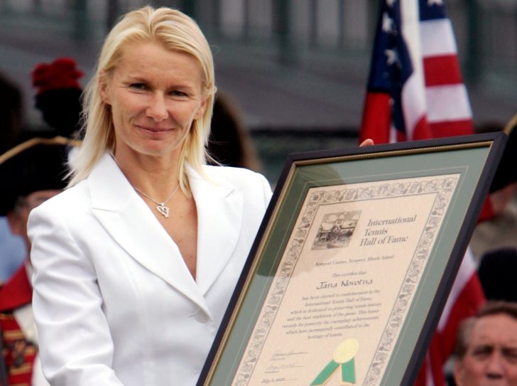 FILE PHOTO: Jana Novotna holds up International Tennis Hall of Fame certificate in Newport