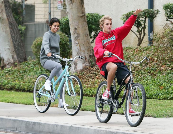 Selena Gomez and Justin Bieber have great fun cruising around on their bikes together in Los Angeles
