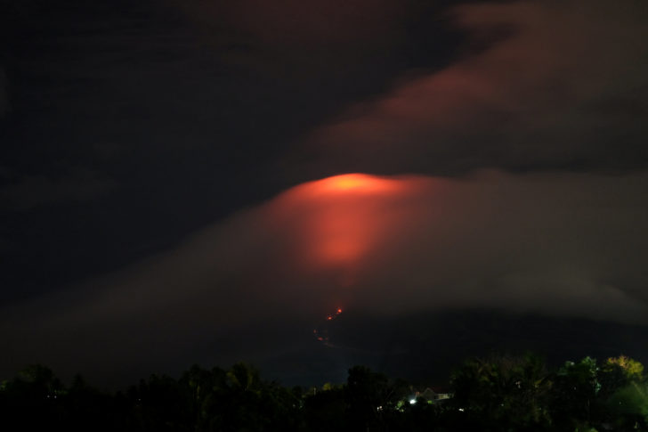 The Mayon volcano's crater glows, pictured from Daraga, Albay